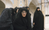 Iran: women wearing black chadors - photo by W.Allgower