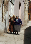 Gaziantep, South-Eastern Anatolia, Turkey: old women help each other - photo by C. le Mire