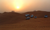 UAE - Dubai: dune bashing safari - sunset - jeeps - 4wds - dunes - photo by Llonaid